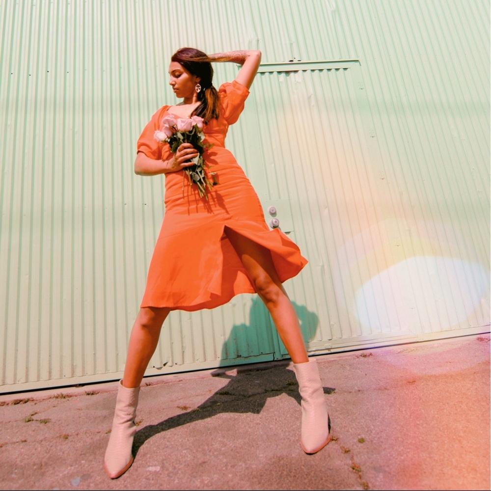Orange balloon sleeved dress
